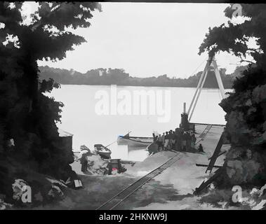 Art inspiré par [Mango [Mago], The Lagoon], studio Burton Brothers, studio de photographie, juillet 1884, Dunedin, photographie en noir et blanc, au centre, un groupe d'hommes fidjiens se trouve au pied d'une grue en bois qui se trouve sur une jetée. Une ligne de chemin de fer part de la jetée où se trouvent deux longs bateaux, Classic œuvres modernisées par Artotop avec un peu de modernité. Formes, couleur et valeur, impact visuel accrocheur sur l'art émotions par la liberté d'œuvres d'art d'une manière contemporaine. Un message intemporel qui cherche une nouvelle direction créative. Artistes qui se tournent vers le support numérique et créent le NFT Artotop Banque D'Images