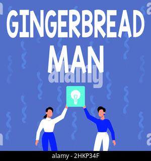 Écriture manuscrite Gingerbread Man. Internet concept cookie fait de pain d'épice habituellement en forme de l'homme deux collègues tenant la lampe de présentation Nouveau Banque D'Images