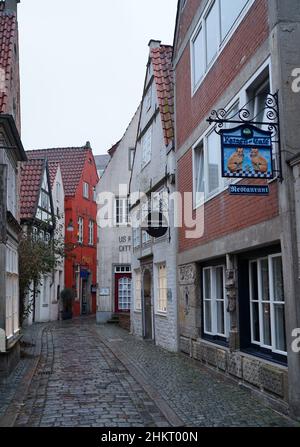 Bremen, Allemagne - Jan 16 2022 Un restaurant de chat dans l'ancien quartier de 'Schnoor' à Brême Banque D'Images