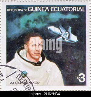 Timbre-poste annulé imprimé par la Guinée équatoriale, qui montre Donna F. Eisele - Apollo 7, vers 1978. Banque D'Images