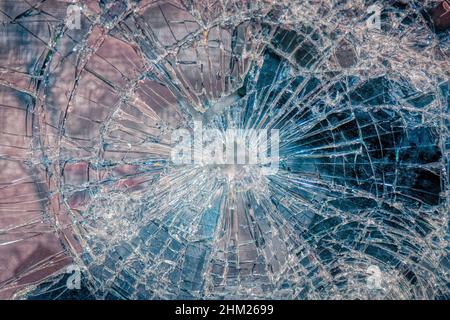 Vitre de verre cassée ou brisée comme arrière-plan Banque D'Images