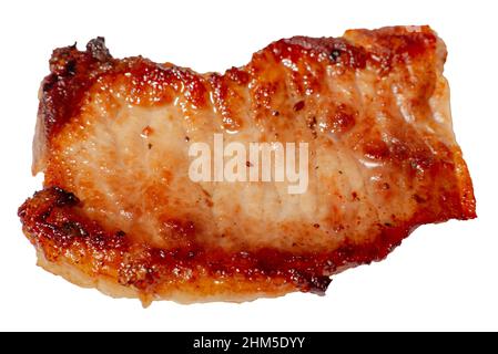 Gros plan sur la texture de la viande grillée isolé sur du blanc. Un morceau de porc gras à une grande approximation. Dommage causé par la viande frite dans l'huile. Banque D'Images