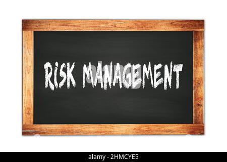 Texte DE GESTION DES RISQUES écrit sur tableau noir de l'école de cadre en bois. Banque D'Images