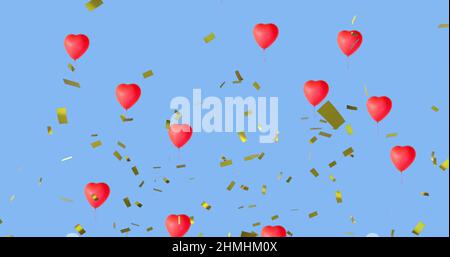 Confetti tombant sur plusieurs ballons en forme de coeur flottant sur fond bleu Banque D'Images