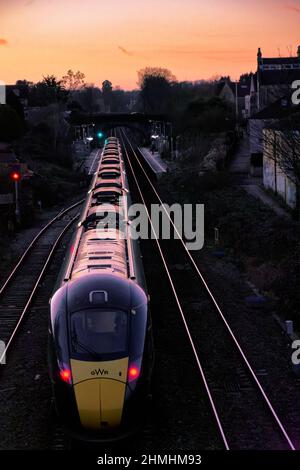 trains à la salle de bain du parc oldfield au coucher du soleil Banque D'Images