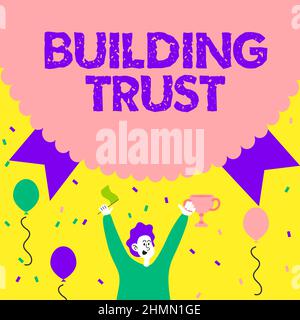 Légende du texte présentant Building Trust. Mot pour l'activité de la confiance émergente entre montrer pour travailler efficacement Homme tenant Trophée de célébration Banque D'Images