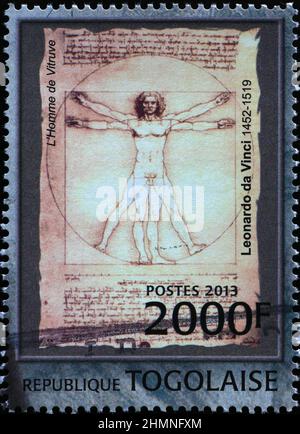 Homme de Vitruvian par Leonardo sur le timbre-poste africain Banque D'Images