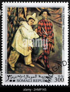 SOMALIE - VERS 1999 : un timbre imprimé en Somalie montre Pierrot et Arlequin, peinture de Paul Cezanne, peintre français, vers 1999 Banque D'Images