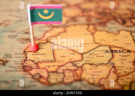 Drapeau de la Mauritanie sur la carte du monde. Le concept de voyage et de tourisme. Banque D'Images