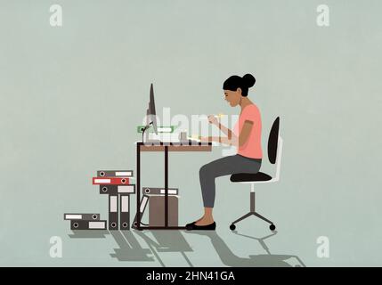 Femme d'affaires occupée à déjeuner à la réception dans le bureau Banque D'Images