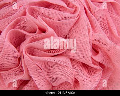 Éponge rose pour le soin de bain de douche texture Banque D'Images