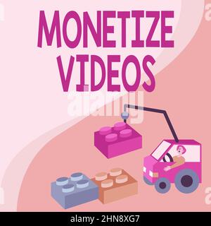 Signe d'écriture à la main monetize vidéos. Mot écrit sur le processus de gagner de l'argent de vos vidéos YouTube téléchargées Man in Crane se déplaçant autour des blocs Banque D'Images