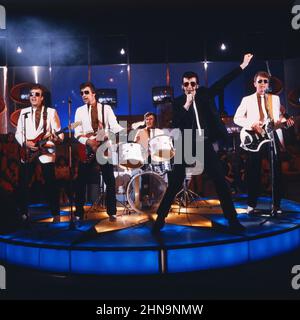 Matchbox, britische Rockabilly, Rock 'n' Roll Band, Steve Bloomfield, Steve Poke, Jimmy Redhead, Sänger Graham Fenton, Ian Terry, 1980. Matchbox, groupe britannique Rockabilly et Rock 'n' Roll, 1980. Banque D'Images