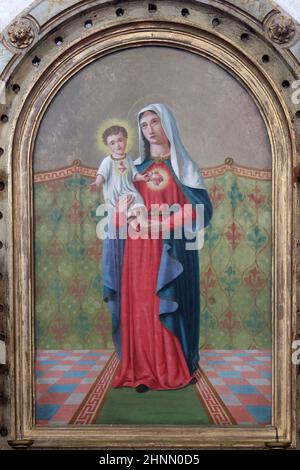 Coeur immaculé de Marie, retable sur l'autel de la Vierge Marie dans l'église de Sainte Barbara à Carevdar, Croatie Banque D'Images