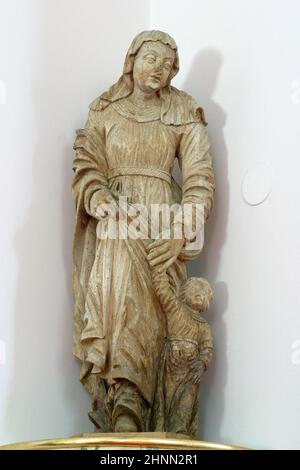 Sainte Anne, statue dans l'église paroissiale de Saint Anthony de Padoue à Vukmanic, Croatie Banque D'Images