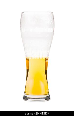 Tall beer glass almost full with lager beer, in the process of drinking. Someone already took a sip from the glass. Isolated on white Stock Photo