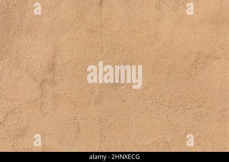 fond de mur en plâtre brun harmonique en détail Banque D'Images