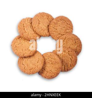 Huit biscuits de noix d'épice dans un anneau sur blanc Banque D'Images