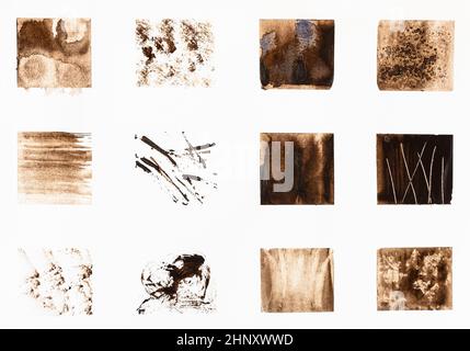 exemples de diverses techniques de peinture à l'aquarelle dessinées à la main en couleur sépia sur papier blanc texturé Banque D'Images