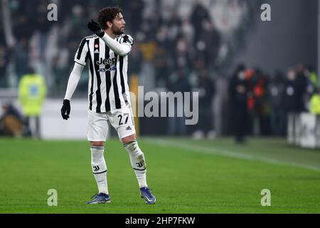 Turin, Italie. 18th févr. 2022. Manuel Locatelli de Juventus FC gestes pendant la série Un match entre Juventus FC et Torino FC au stade Allianz le 18 février 2022 à Turin, Italie. Credit: Marco Canoniero / Alamy Live News Banque D'Images