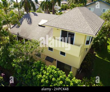 Maison jaune sur Kai Ikena Drive à Kalaheo sur Kauai Banque D'Images