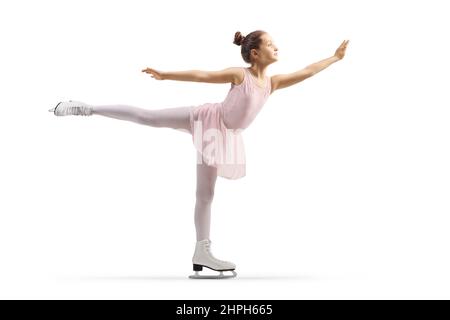 Fille dans une robe rose exécutant patinage sur glace isolé sur fond blanc Banque D'Images