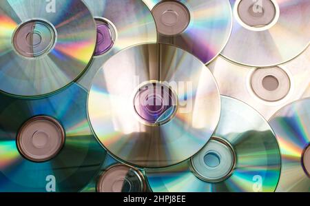 Arrière-plan des disques compacts. Technologie vintage de 90s. Banque D'Images