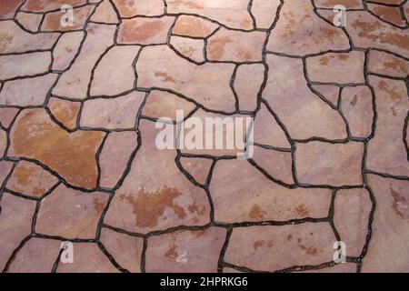 Carreaux modernes de mosaïque de dalles de dalles avec texture aléatoire chaotique pour la construction de mur de pierre, de plancher de patio ou de terrasse. Banque D'Images