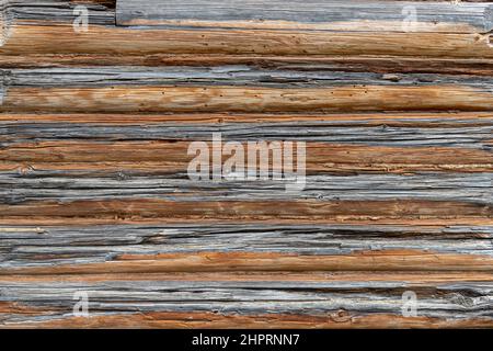 Texture de la paroi de la grange en bois faite de planches altérées Banque D'Images