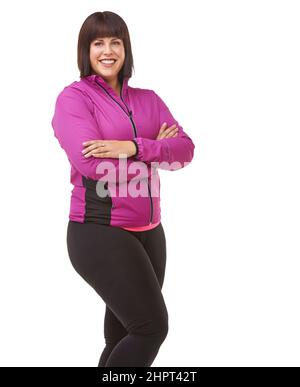 Prêt à être mis en forme. Portrait d'un modèle de taille plus en vêtements d'exercice sur fond blanc. Banque D'Images