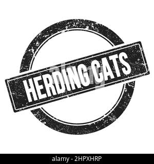 TEXTE DES CHATS HERDING sur un timbre rond noir grungy vintage. Banque D'Images