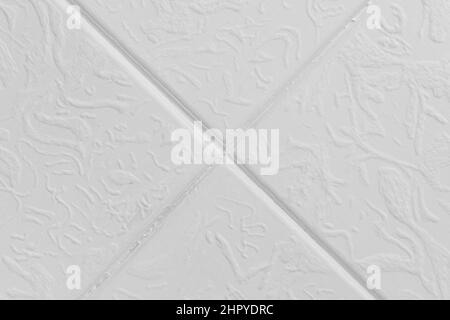 Plaque en PVC blanc clair brillant abstrait matériaux décoratifs motifs pour le décor de plafond Décoration d'arrière-plan texture. Banque D'Images