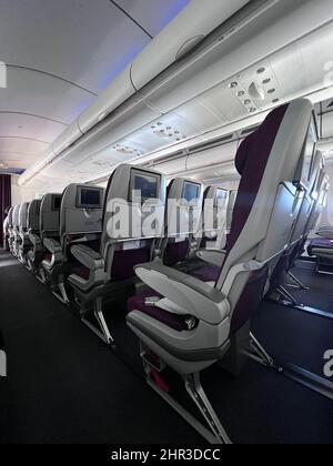 Rangées de sièges ouverts sur le vol Qatar Air Banque D'Images