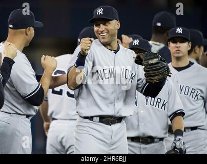 New York Yankees shortstop Derek Jeter stretches just before the New York  Yankees played the Anaheim Angels at Yankee Stadium in the Bronx on August  21, 2004. (UPI Photo/John Angelillo Stock Photo 