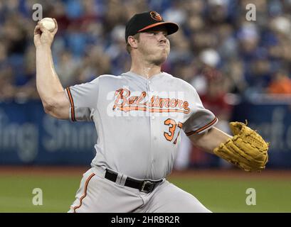 Baltimore Orioles starting pitcher Dylan Bundy reacts after center fielder Adam  Jones hit him with a pie after Bunday threw a one-hit baseball game against  the Seattle Mariners in Baltimore, Tuesday, Aug.