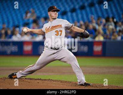 Baltimore Orioles starting pitcher Dylan Bundy reacts after center fielder Adam  Jones hit him with a pie after Bunday threw a one-hit baseball game against  the Seattle Mariners in Baltimore, Tuesday, Aug.