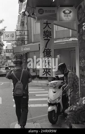 Belle photo de personnes en Tai, Taïwan - niveaux de gris Banque D'Images