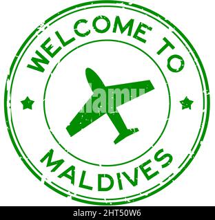 Grunge vert bienvenue aux Maldives mot avec l'icône d'avion rond cachet de caoutchouc sur fond blanc Illustration de Vecteur