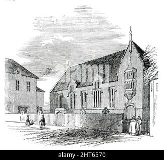 King Edwards's Grammar-School, à Lichfield, [Staffordshire], 1850. «À cette école, certains des hommes les plus éminents de ce pays ont reçu les rudiments de leur éducation. Parmi les plus distingués [fut] le célèbre docteur Samuel Johnson... le bâtiment actuel a été commencé en 1849, et est un design très élégant, par MM. Johnson et son, les architectes. C'est du style élisabéthain, de la brique rouge riche et de la pierre ornementale... l'école a un très grand terrain de jeu, entouré d'un beau mur... l'ensemble est admirablement exécuté, et est un grand ornement à la ville. MM. Watts et Na Banque D'Images