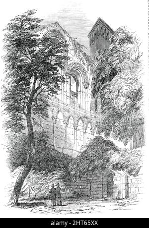 Abbaye de Glastonbury - intérieur de la chapelle Saint-Joseph, de la crypte, 1850. Abbaye médiévale en ruines à Glastonbury, Somerset. Vue montrant la chapelle qui a été '... excavée au printemps de 1825, quand a été découvert un puits en dessous d'une arche a...Norman sur le côté sud de la chapelle... St. La chapelle de Joseph a été finie à la fois à l'intérieur et à l'extérieur, dans ses formes et ses ornements, avec la meilleure compétence, l'art le plus beau et le goût le plus correct; et présentée à l'oeil, probablement, le spécimen le plus choquant et le plus parfait dans le royaume d'un édifice ecclésiastique anglo-normand Banque D'Images