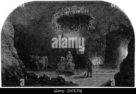 L'arbre - descente du godet, Marston Salt-Pit, 1850. Scène à la mine Marston, près de Northwich, à Cheshire. '...chaque installation a été présentée à des étrangers qui désiraient voir les merveilles des mines... nous nous sommes fournis quelques shillings '-valor de lumières bleues - une préliminaire essentielle à ceux qui souhaitent voir la mine à l'avantage... [la mine] s'étend sous environ trente-cinq acres, et l'arbre est de 250 yards de profondeur... le seau vide a monté, et notre tour est venu à être laissé tomber dans les entrailles de la terre. La motion était agréable, et la descente, contrairement à celle dans une mine de charbon, W Banque D'Images