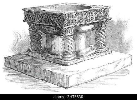 New font for Easton Church, près de Winchester, 1850. Police de pierre pour l'église Sainte Marie, '...exécutée entièrement par les mains d'une dame, résidant également dans la paroisse. C'est de la pierre de Caen, la conception étant prise de la célèbre vieille police dans l'église de New Shoreham, qui, portant les caractéristiques de la fin Norman, a été choisi de manière appropriée pour le modèle. Il est carré de 2 pieds 9 pouces, et a un pilier central massif et quatre arbres en spirale; les côtés ont chacun un modèle différent, profondément coupé; le bouchon est en bronze, sous la forme d'une croix laten. L'artiste de ce cadeau précieux a été employé somew Banque D'Images