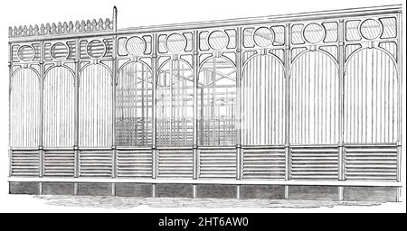 The Great Exhibition Building à Hyde Park - partie du South Front, 1850. 'Le front sud du "Palais industriel" vers la route de Kensington... une fois terminé, présentera sur l'ensemble plutôt une élévation agréable, bien que ininterrompue par toute projection de matériel, soit dans le plan ou la section. Toute la surface, cependant, étant subdivisée en panneaux, et surmontée par des lumières ouvertes, et couronné d'une frise ornementale, soulage l'œil de toute apparence monotone... dans toute la longueur du Front Sud il y a en tout soixante-dix-huit colonnes en fonte, placées. Banque D'Images