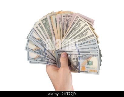 Main tenant des billets de cent dollars américains isolés sur fond blanc. Argent américain. Photo de haute qualité Banque D'Images