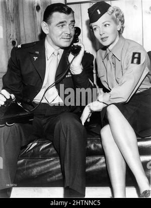 CLARK PIGNON et LANA TURNER sur le set dressing ont fait le vexu pendant le tournage de LA MAISON 1948 réalisateur MERVYN Leroy histoire Sidney Kingsley costume conception Helen Rose Metro Goldwyn Mayer Banque D'Images