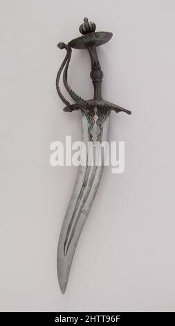 Art inspiré par Dagger (Chilanum), 17th siècle, Inde du Sud, acier, H. 16 3/16 po. (41,1 cm) ; H. de la lame 11 1/4 in. (28,6 cm) ; avec 4 5/8 po (11,7 cm) ; poids 1 lb 3,7 oz (558,5 g), daggers, oeuvres classiques modernisées par Artotop avec une touche de modernité. Formes, couleur et valeur, impact visuel accrocheur sur l'art émotions par la liberté d'œuvres d'art d'une manière contemporaine. Un message intemporel qui cherche une nouvelle direction créative. Artistes qui se tournent vers le support numérique et créent le NFT Artotop Banque D'Images