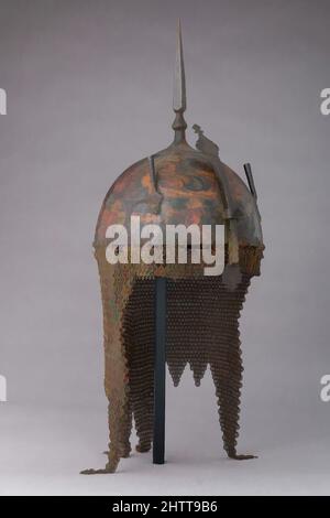 Art inspiré par Helmet, Arm Guard et Shield, env. 1800, Perse, acier, pigment, laque, Textile, Helmet (a); H. y compris le courrier 21 3/4 in. (55,2 cm) ; H. à l'exclusion du courrier et du nez, 9 3/4 po (24,8 cm) ; avec 7 1/4 po (18,4 cm) ; D. 7 5/8 po (19,4 cm) ; poids 2 lb 2,5 oz (978,1 g), casques, oeuvres classiques modernisées par Artotop avec une touche de modernité. Formes, couleur et valeur, impact visuel accrocheur sur l'art émotions par la liberté d'œuvres d'art d'une manière contemporaine. Un message intemporel qui cherche une nouvelle direction créative. Artistes qui se tournent vers le support numérique et créent le NFT Artotop Banque D'Images