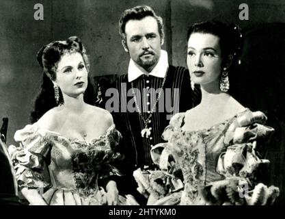 Les actrices américaines Martha Hyer et Barbara Rush, et l'acteur Rex Reason dans le film Kiss of Fire, USA 1955 Banque D'Images