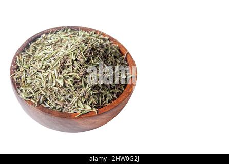 Thym biologique séché dans un bol sur fond blanc Banque D'Images