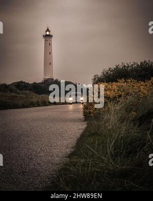 Phare de Lyngvig FYR dans la ribe du danemark près de henne, debout dans les dunes de sable Banque D'Images